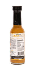 The Spicy Shark sauce drizzled on grilled shrimp demonstrating flavor boost for seafood
