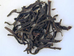 The Tao of Tea brewed cup in a kitchen scene showing clear amber liquor and serving idea