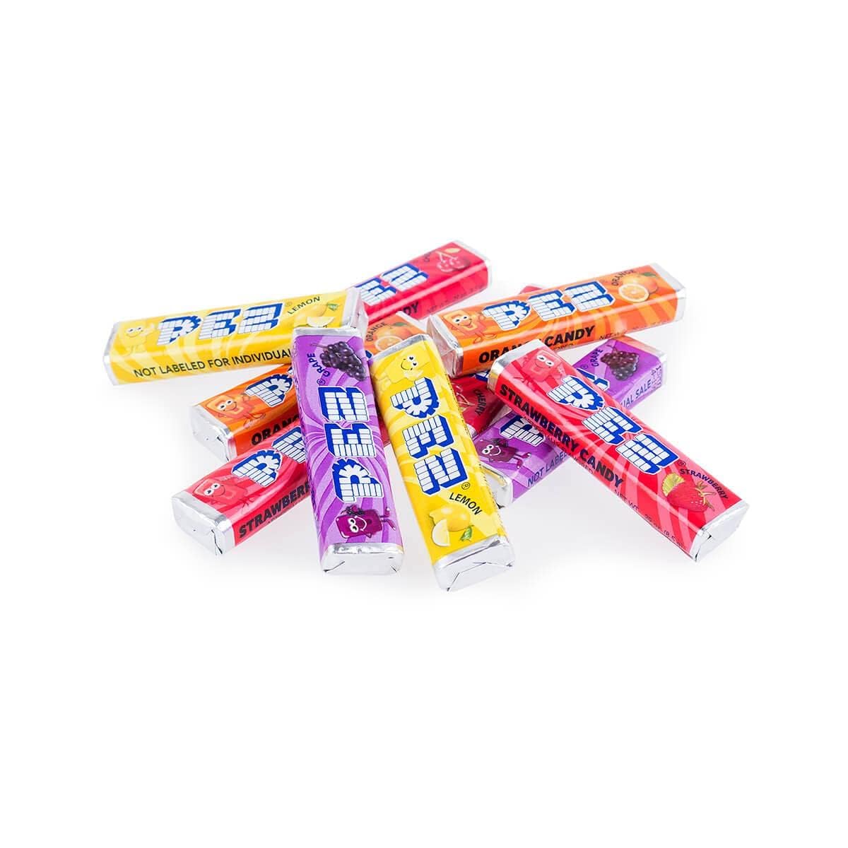 TheCandyCo PEZ in a dispenser showing refill action for easy serving benefit