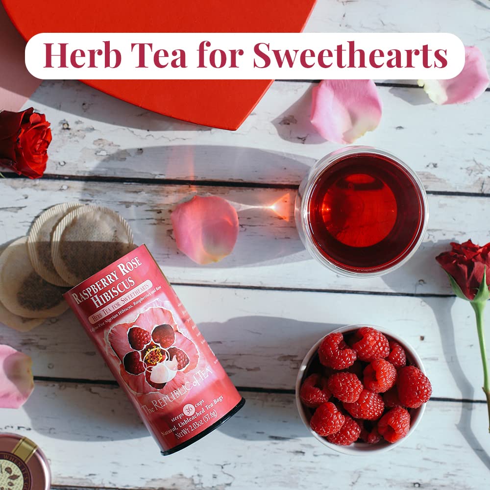 Arrangement of Nigerian hibiscus, rose hips and apple pieces labeled The Republic of Tea showing ingredient transparency