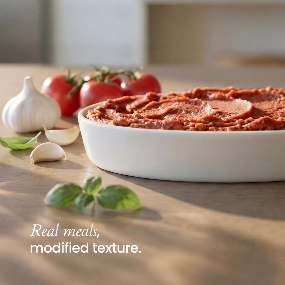 Thick & Easy open tray close-up showing smooth pureed lasagna texture for easy swallowing