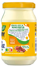 Thomy mayonnaise spread on sandwich in use, enhancing flavor and moistness
