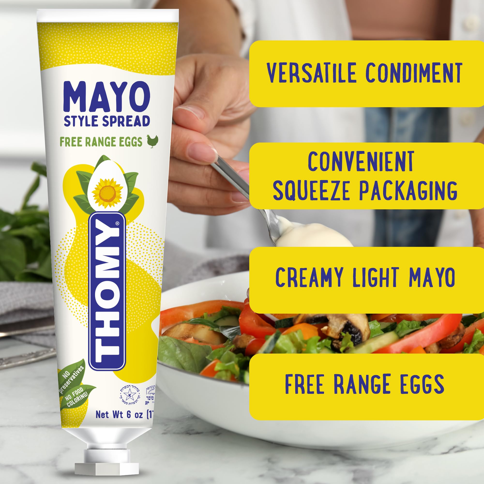 Osem Thomy tube in hand for scale showing compact travel-friendly condiment size
