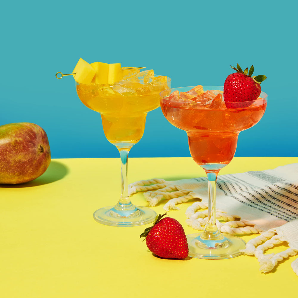 Thoughtfully mango mixer pouring into shaker, showcasing smooth texture for cocktails