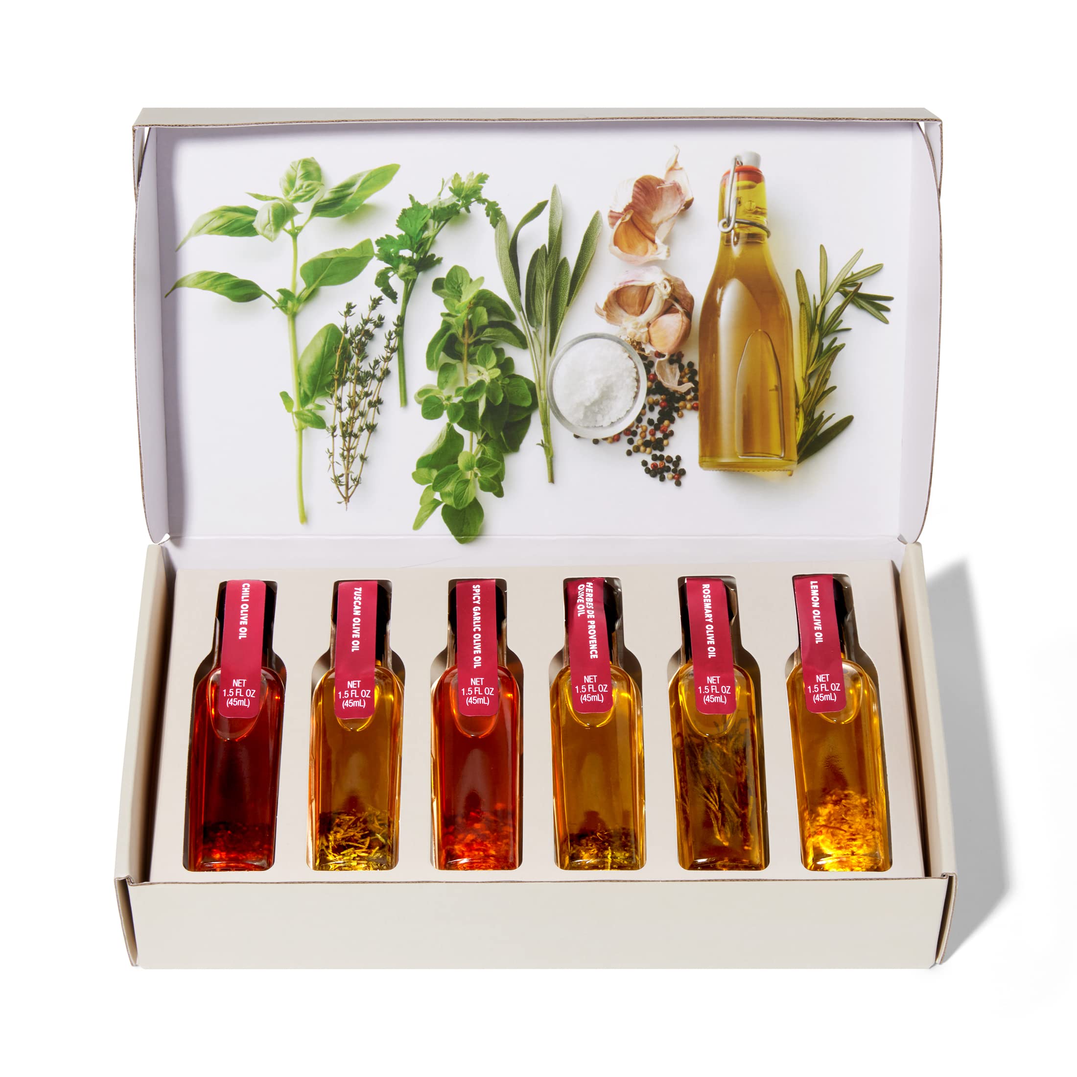 Thoughtfully bottle held in hand to show scale and convenient kitchen portion size