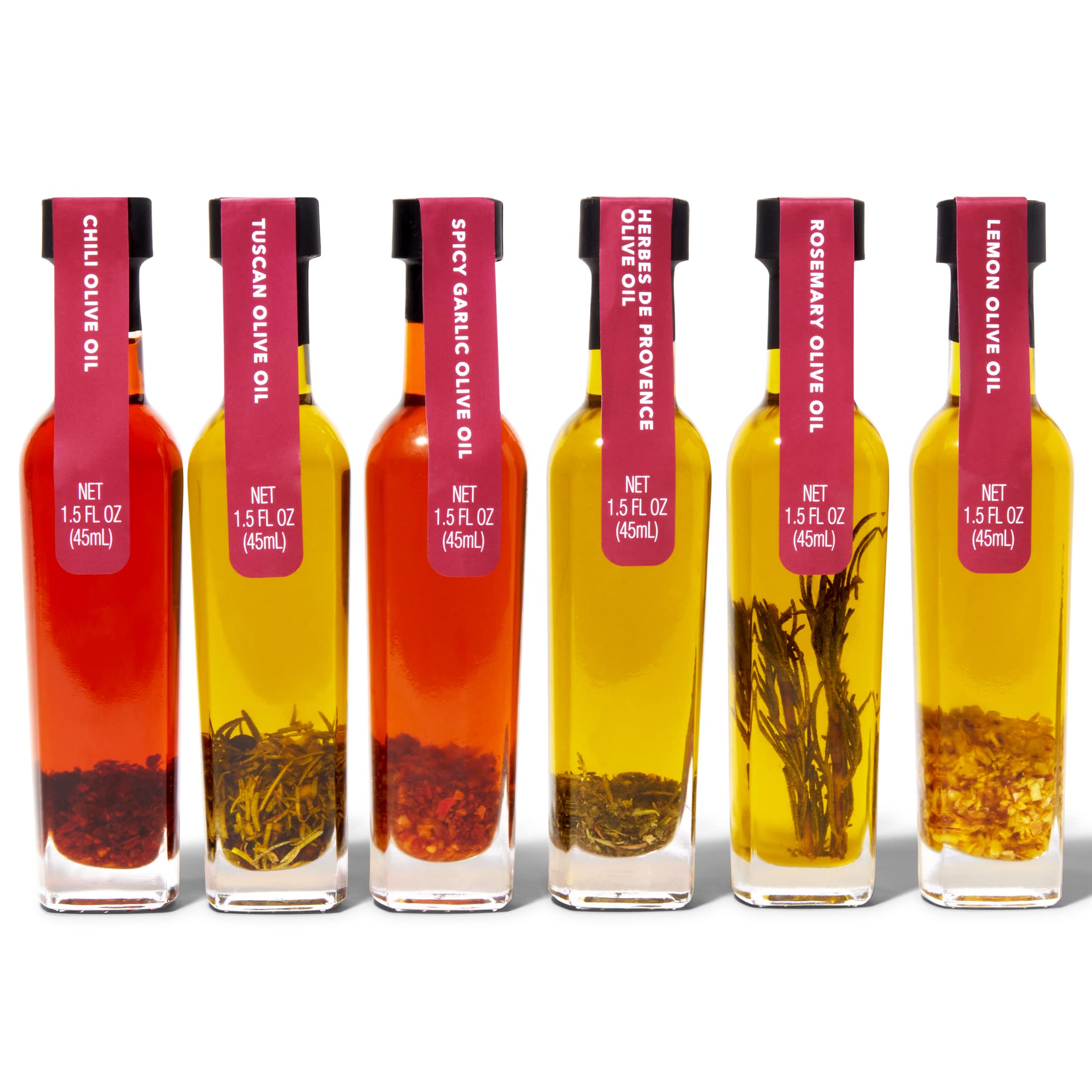 Thoughtfully six infused olive oil bottles lined up highlighting flavor variety and choice