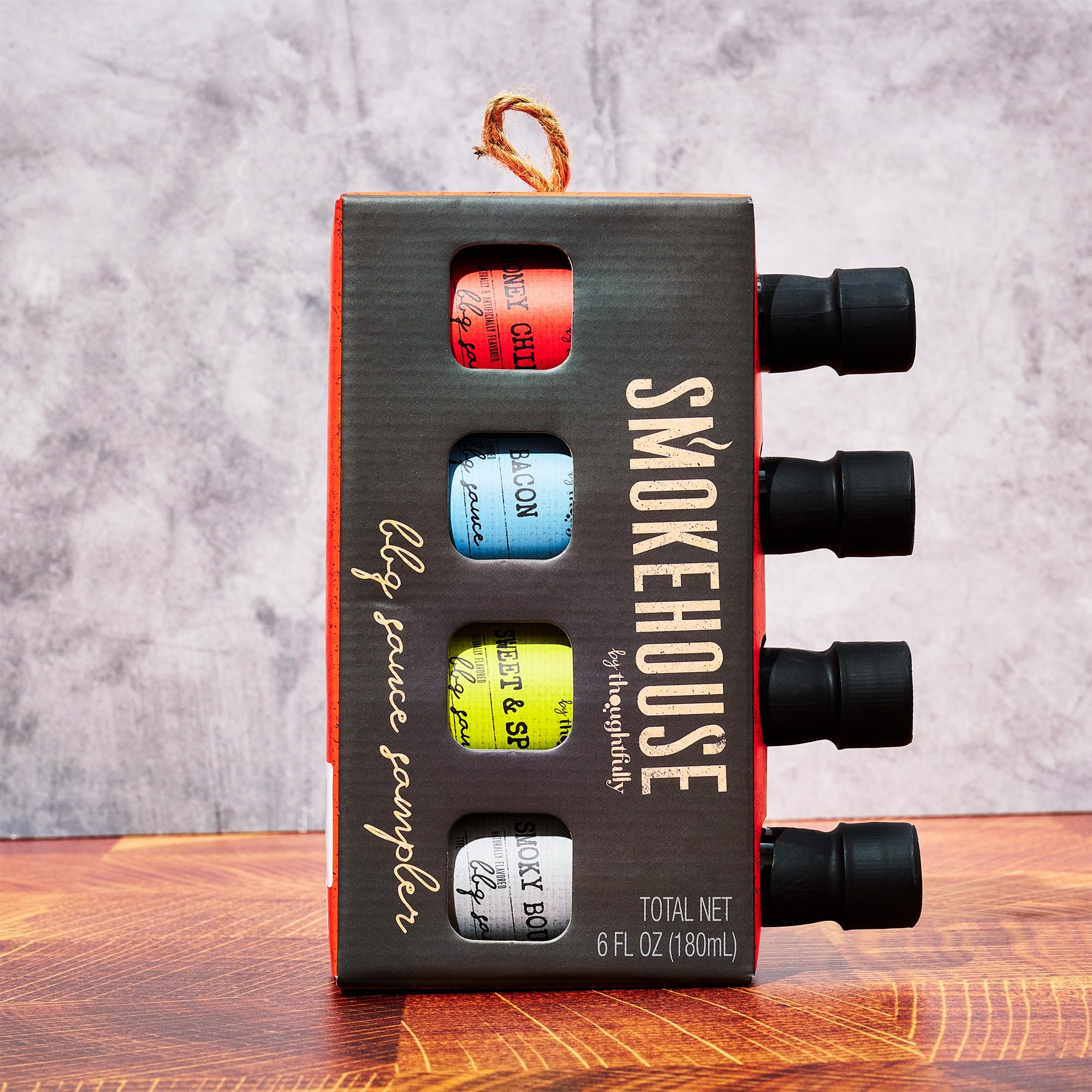Thoughtfully bottle held in hand demonstrating compact size and portability