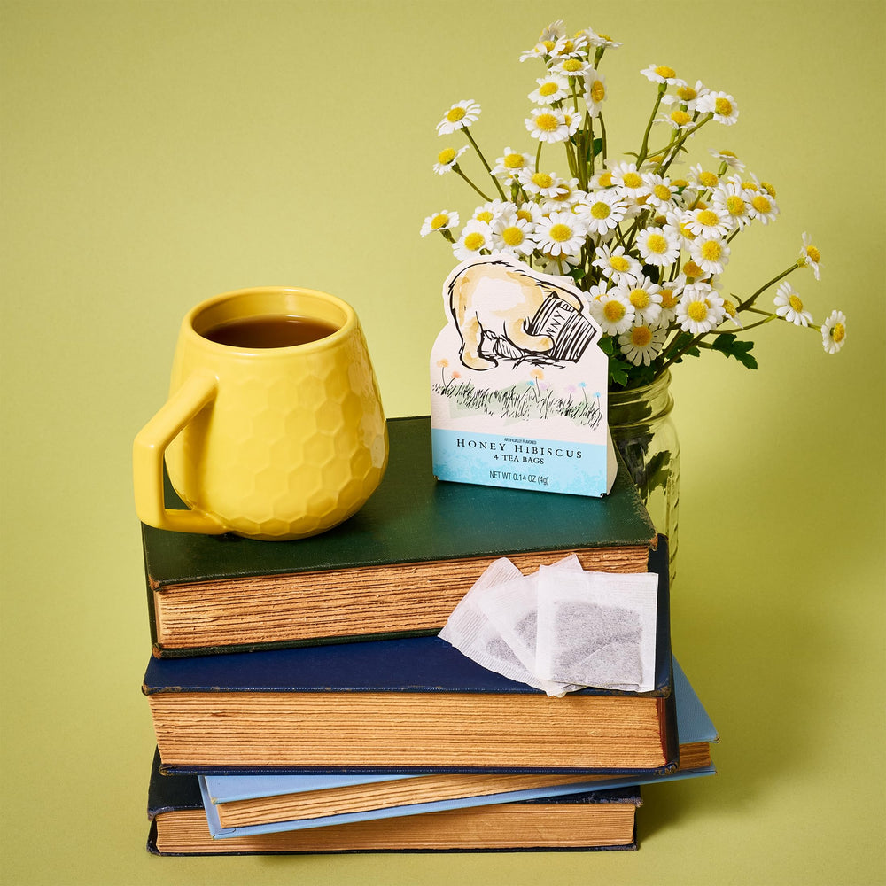Thoughtfully hand holding a box to show compact scale and easy gifting
