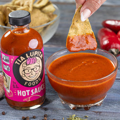 TIA LUPITA sauce on spoon displaying texture that clings to food