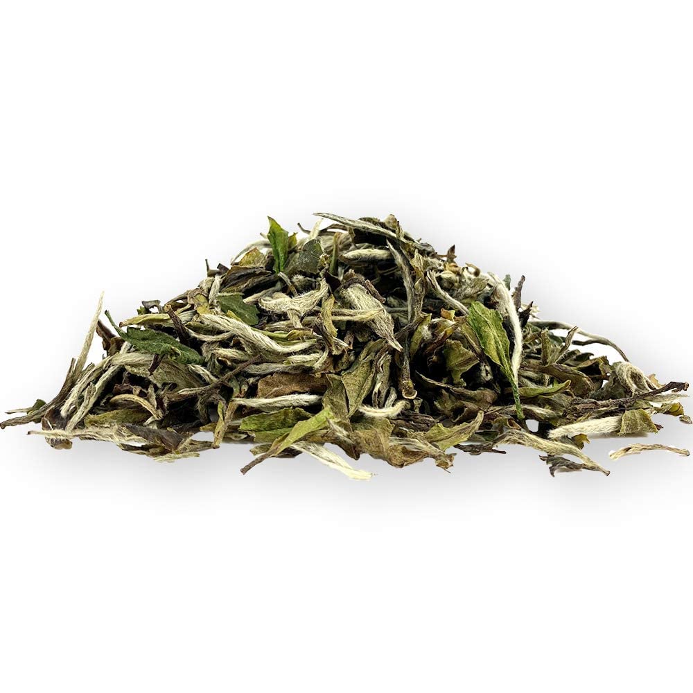 Tian Hu Shan lifestyle scene of tea moment, highlights calming at-home ritual