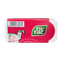 Tic Tac closeup of strawberry Tic Tacs texture highlighting sweet berry flavor