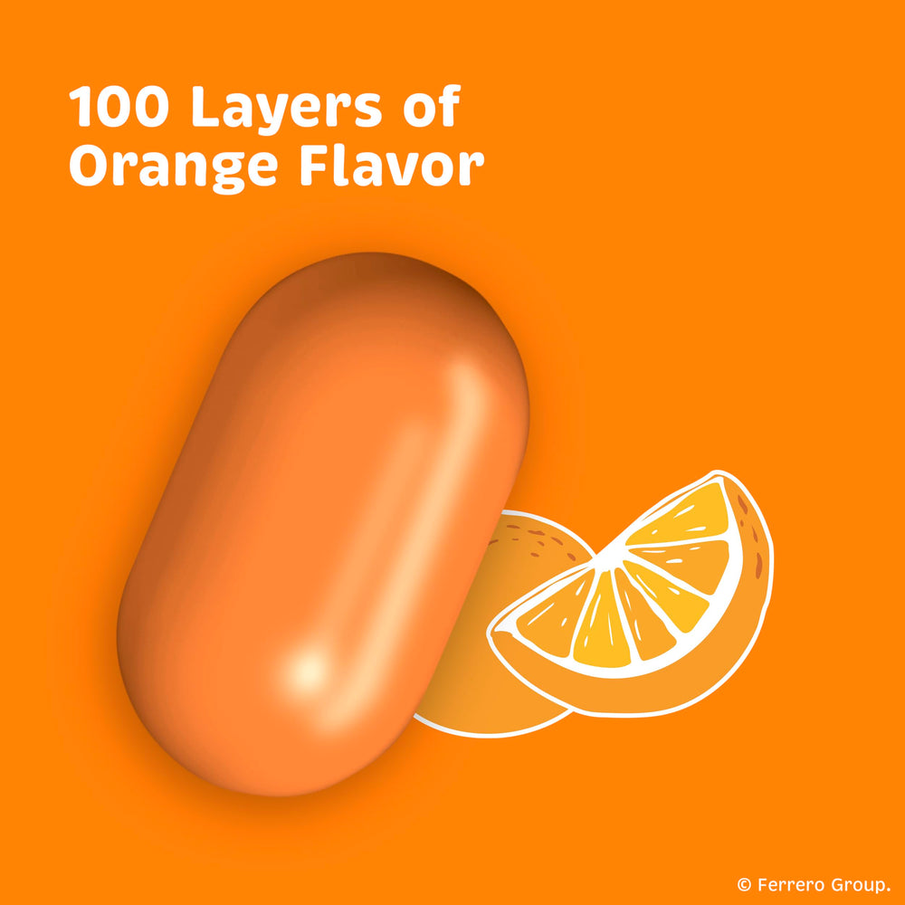 Tic Tac close-up of orange mint texture highlighting crisp shell and concentrated flavor