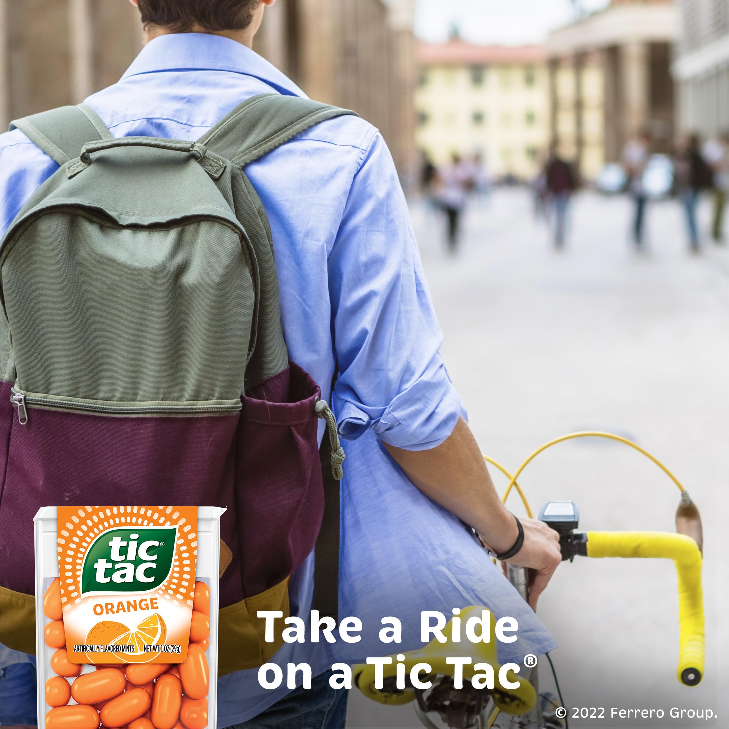 Tic Tac orange pack tucked in a jeans pocket illustrating portability and easy grab-and-go refreshment