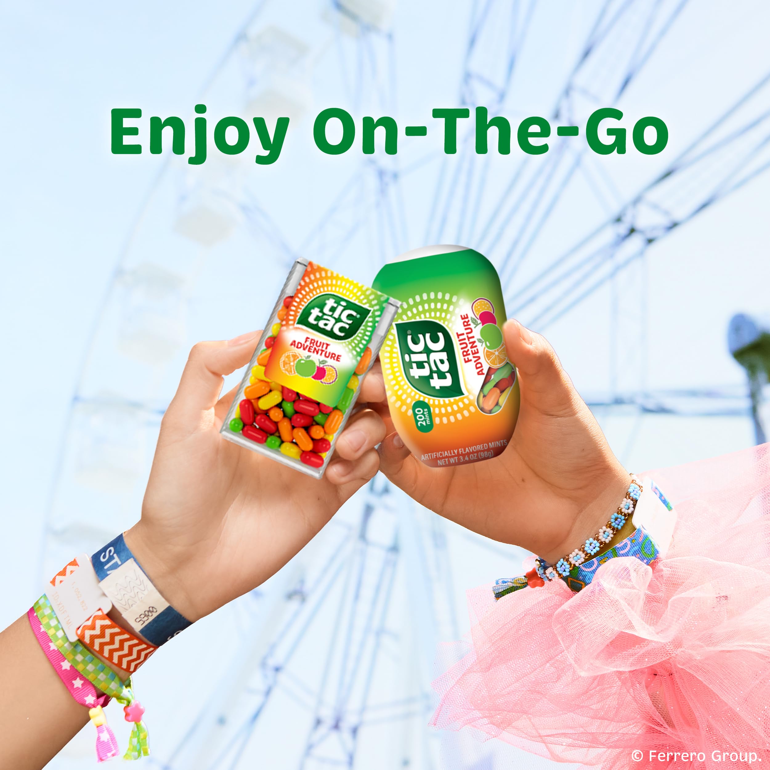 Tic Tac refill action in hand demonstrating simple transfer into the pocket pack