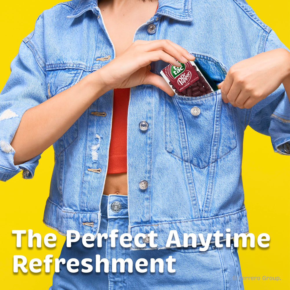 Tic Tac pack beside travel essentials on a car seat for convenient road-trip flavor