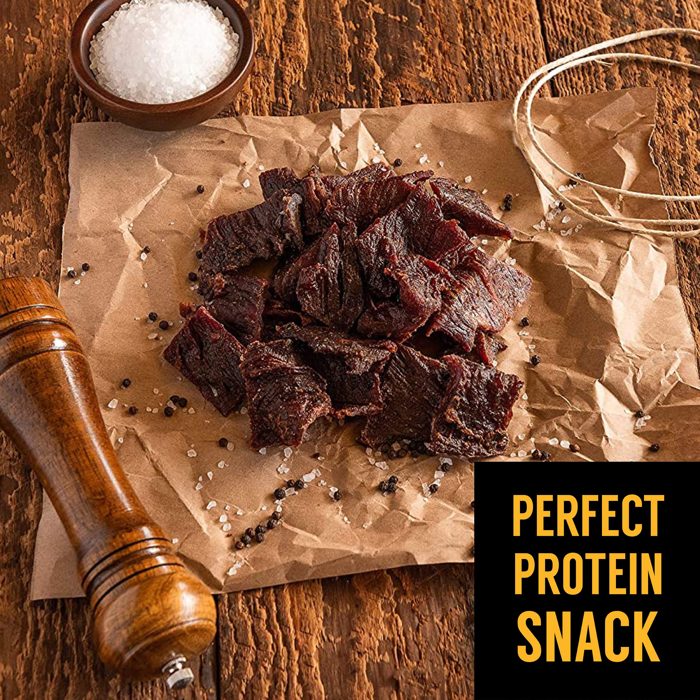 Tillamook Country Smoker bite in hand demonstrating portable snack portion