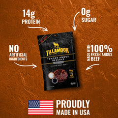 Tillamook Country Smoker jerky held in hand showing portion size and portability