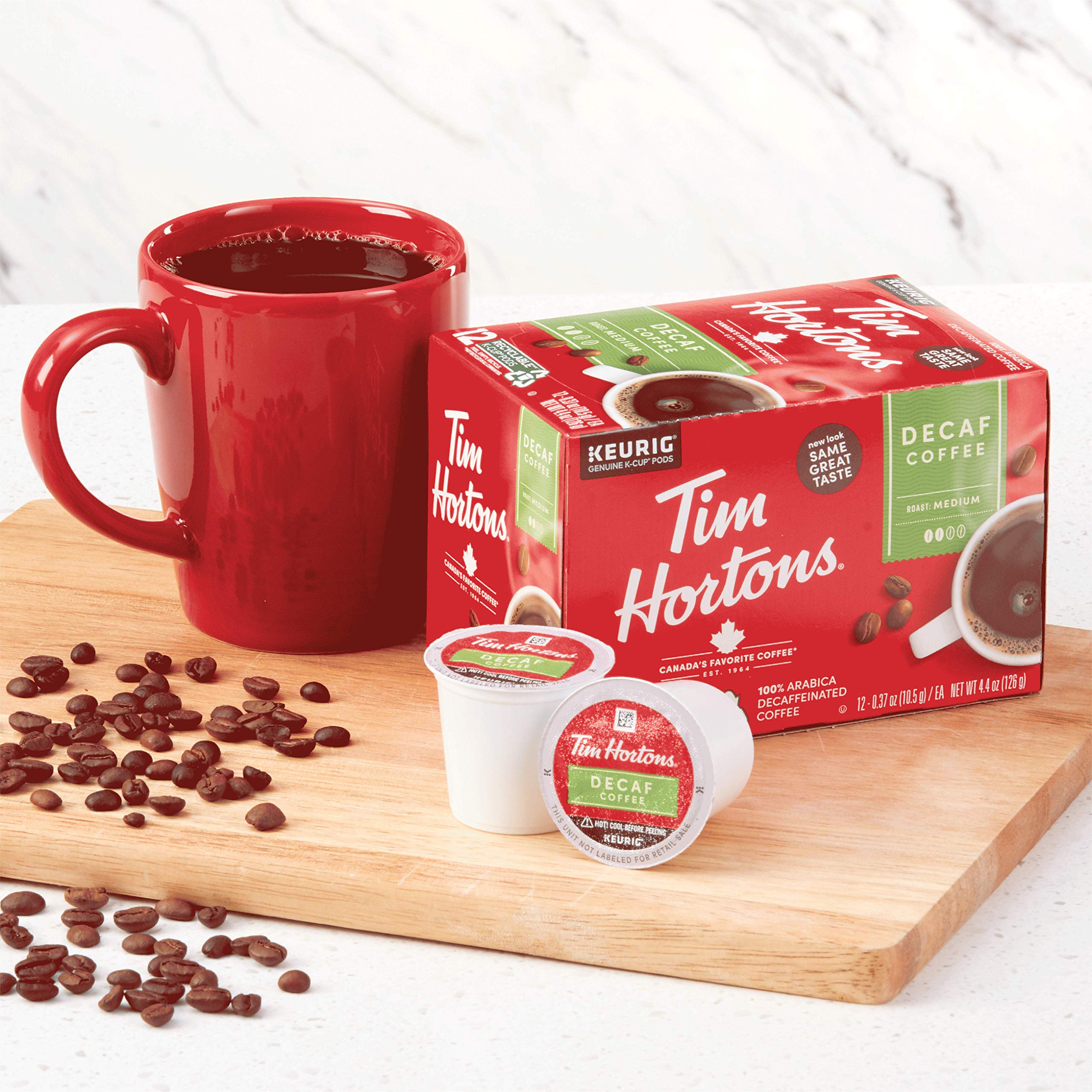 Stack of Tim Hortons decaf pack-of-6 boxes for scale and stash-friendly supply at home or office