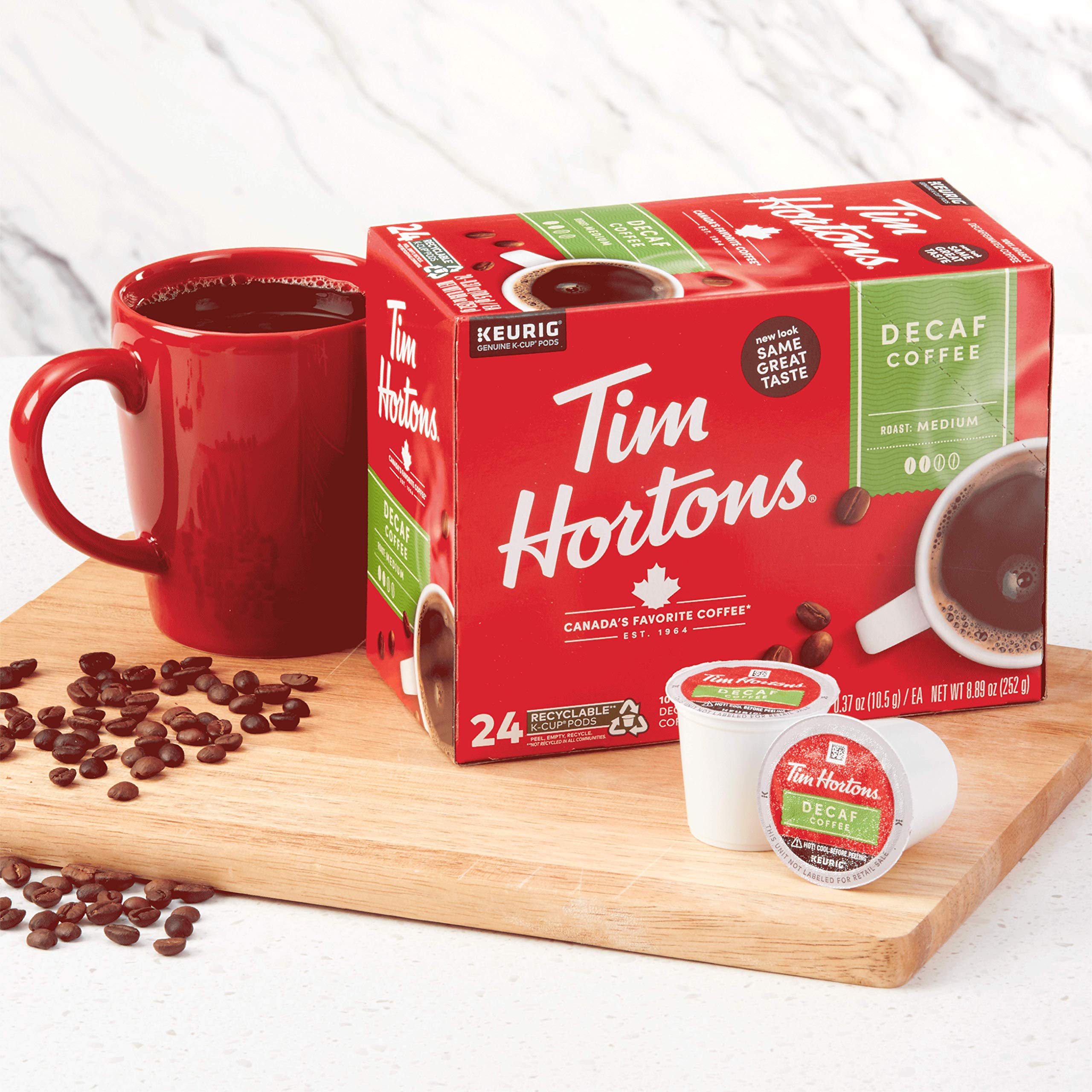 Tim Hortons pod with recycling icon showing how to empty and recycle grounds