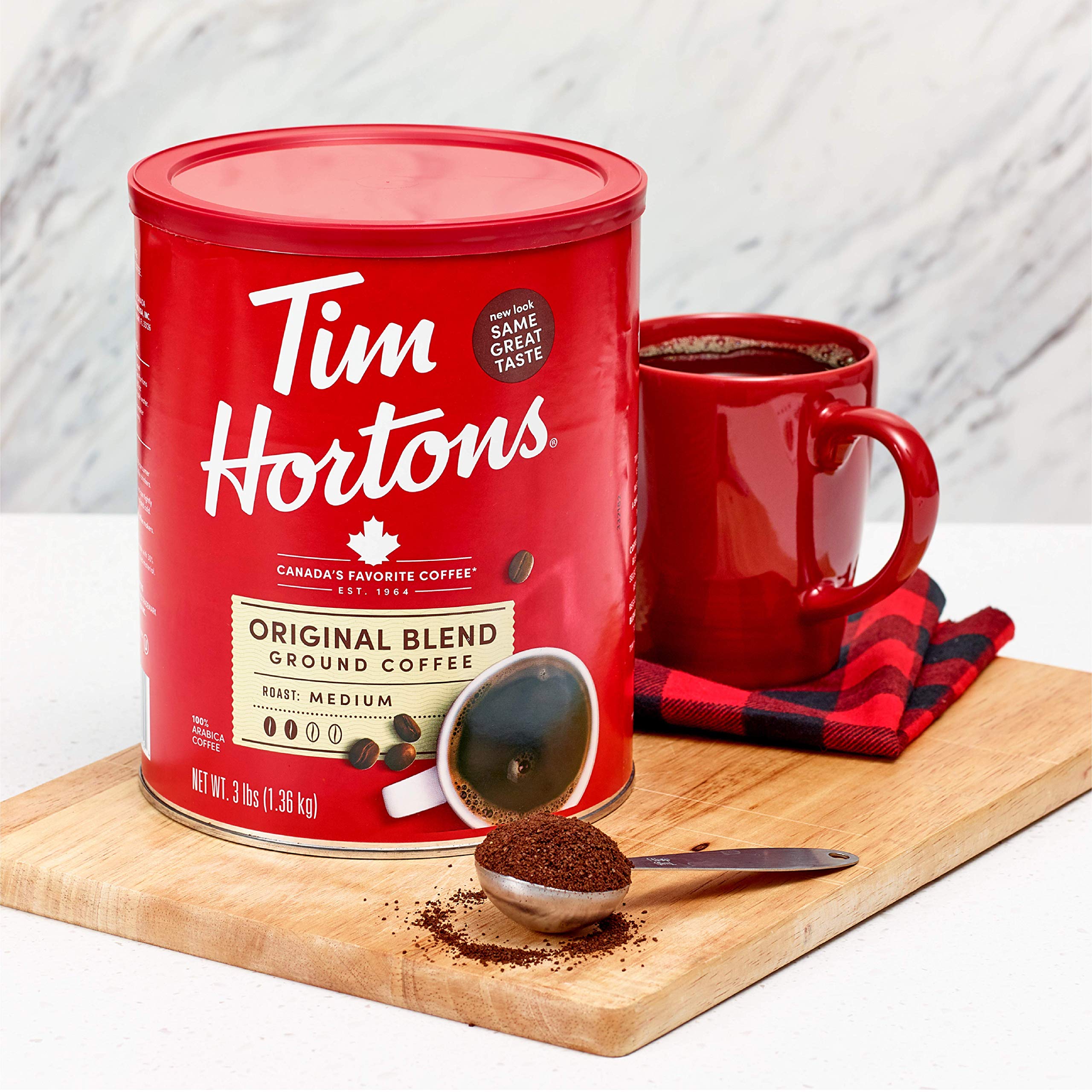 Tim Hortons canister next to common kitchen items showing 48 oz scale