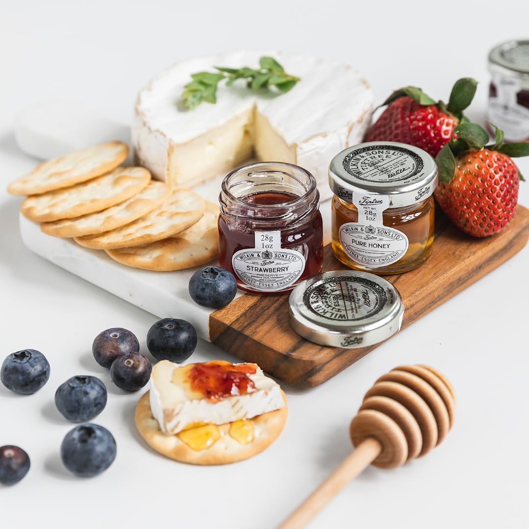 Tiptree close-up of strawberry preserve spread on toast, showcases texture and flavor