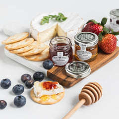 Tiptree close-up of strawberry preserve spread on toast, showcases texture and flavor