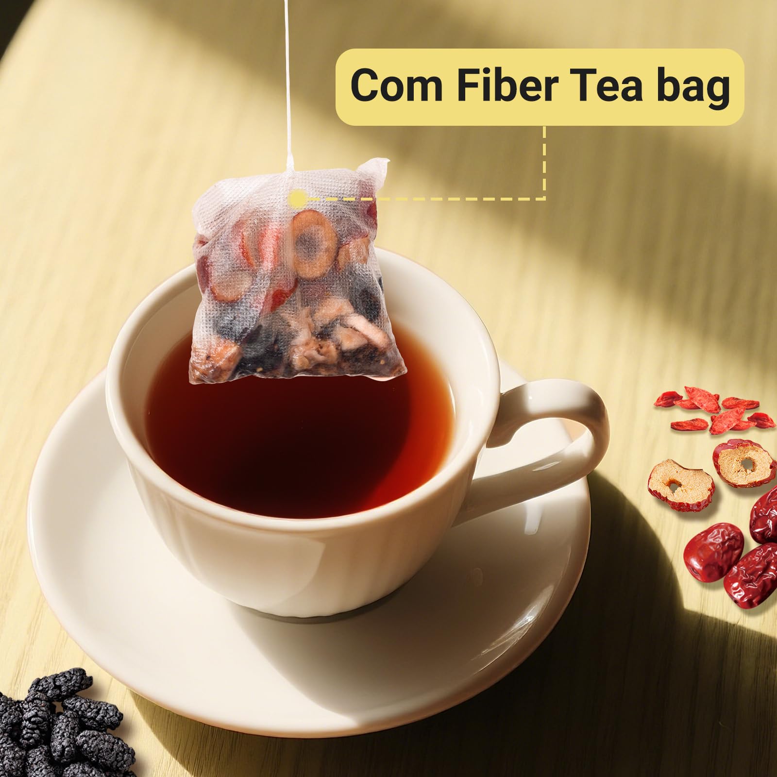 Tiucm tea bag beside ruler showing size and 10 g portion for portion clarity