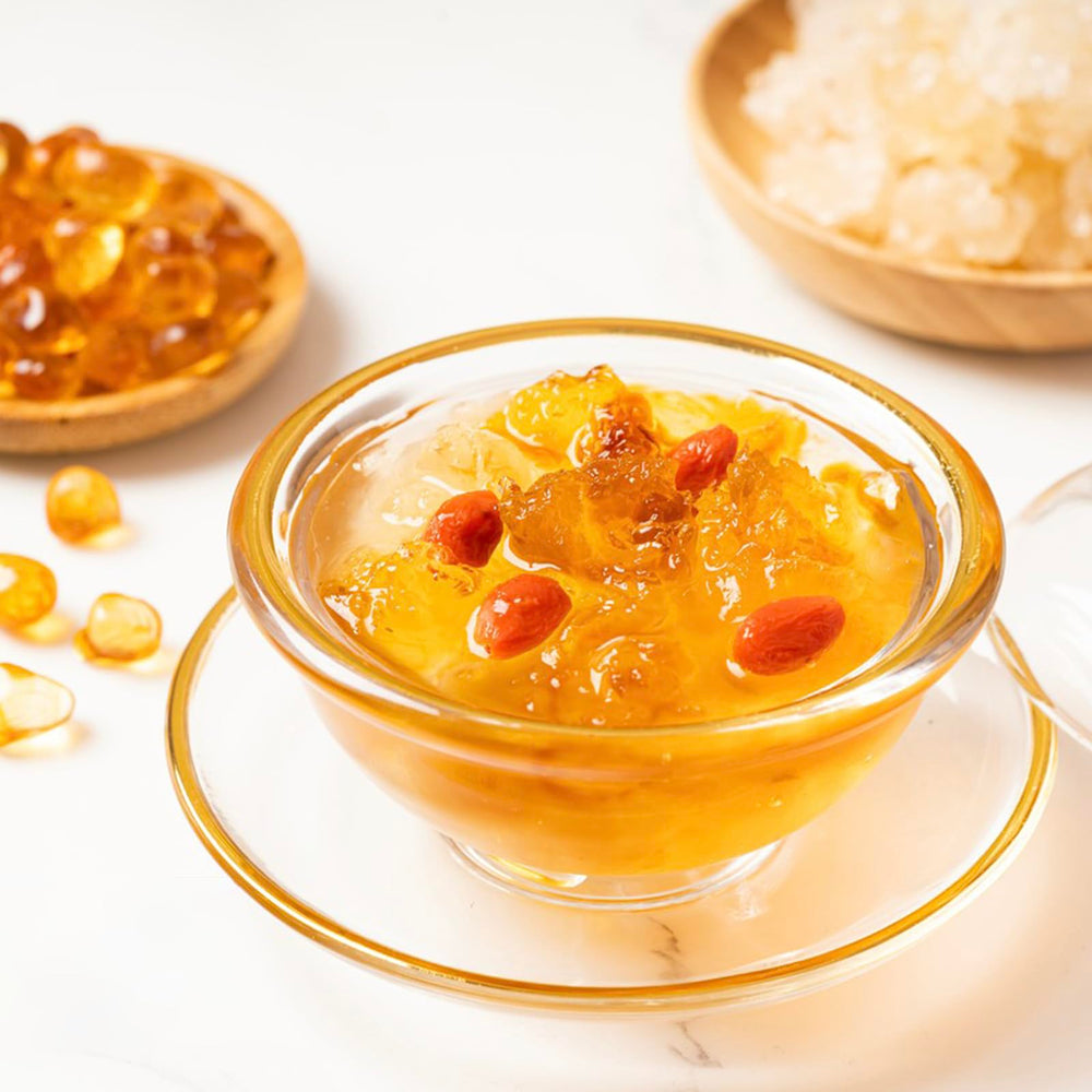 TooGet peach gum next to a measuring spoon showing portion size and ease of use