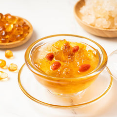 TooGet peach gum next to a measuring spoon showing portion size and ease of use