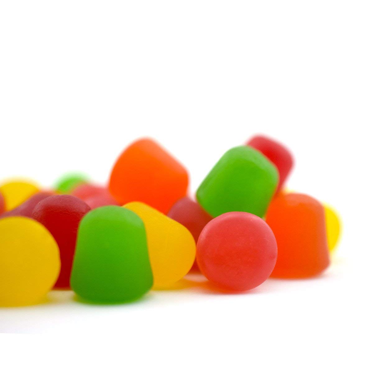 Tootsie Roll DOTS held in hand for size comparison and easy single-serve portioning