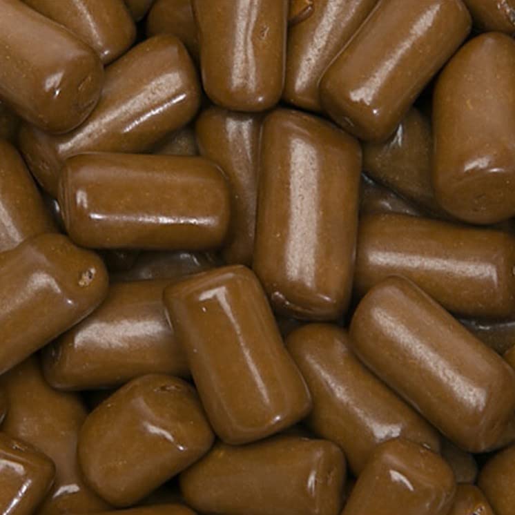 All City Candy Tootsie Roll hand holding a few mini bites for scale and convenience