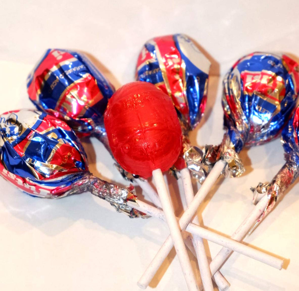 Tootsie Roll Tutsi Pop close-up of cherry shell and gum center highlighting texture contrast
