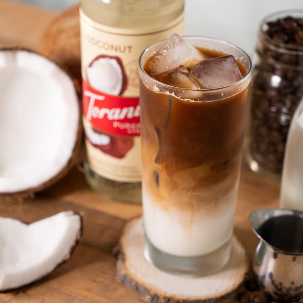 Pouring Torani coconut syrup close-up showing smooth texture and easy mixing for beverages