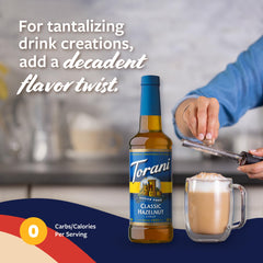 Torani hazelnut syrup poured into espresso to add nutty flavor and aroma
