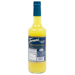 Torani lemon syrup pouring into iced drink for bright flavor without added sugar