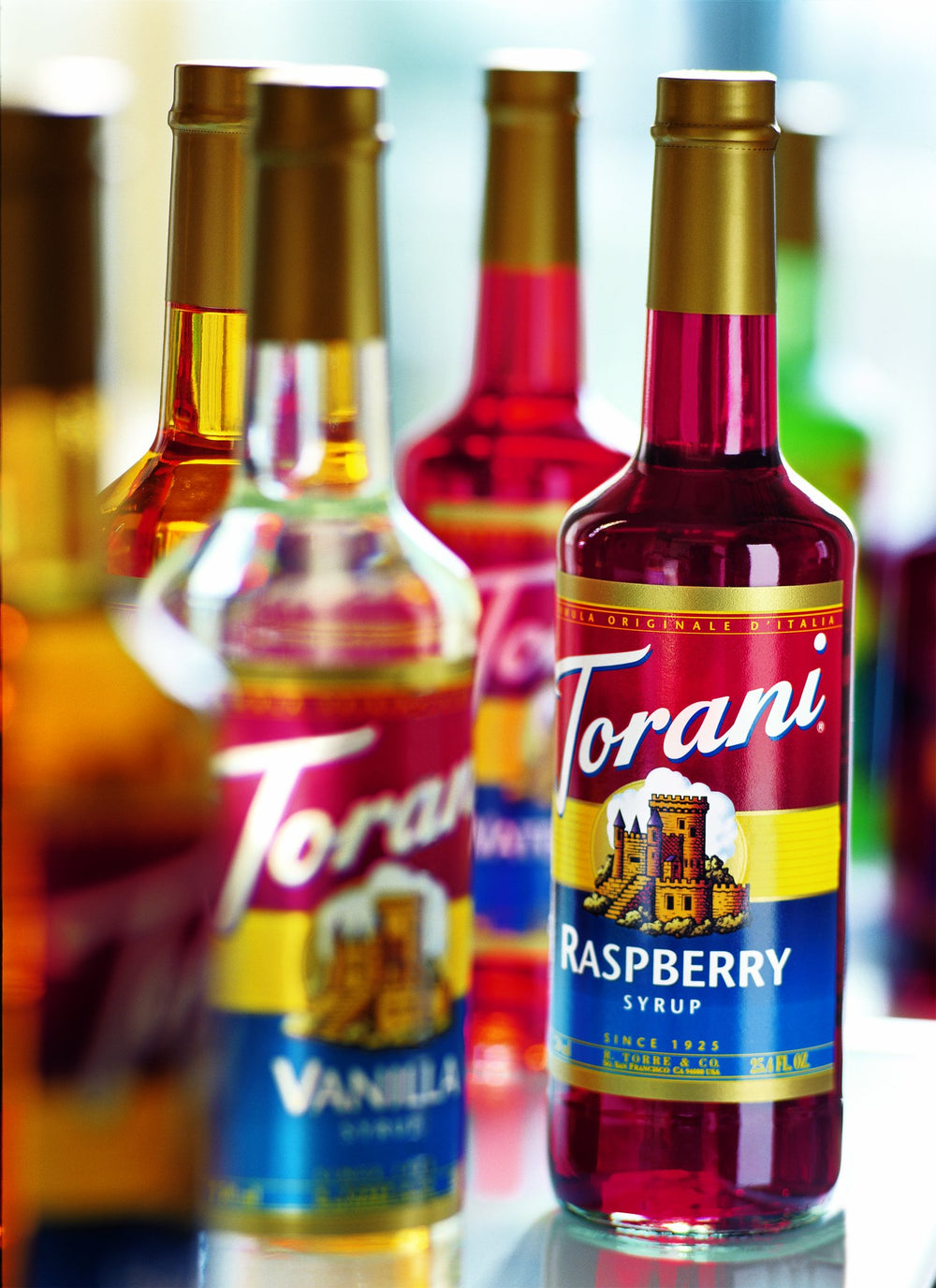 Torani mango syrup blended into an iced mocktail demonstrating bright fruity flavor