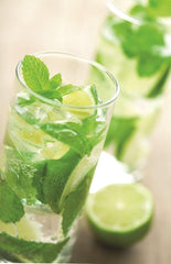 Torani Mojito Mint syrup pouring into glass, demonstrates easy dosing and mixing