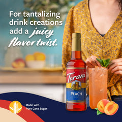 Torani peach syrup pouring close-up showing texture and vibrant color
