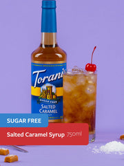 Torani syrup pouring into espresso stream for consistent flavoring