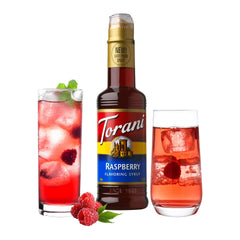 Torani bottle mid-pour over glass demonstrating controlled dispensing and convenience