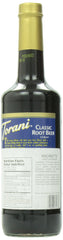 Torani root beer syrup poured over vanilla ice cream creating a classic float experience