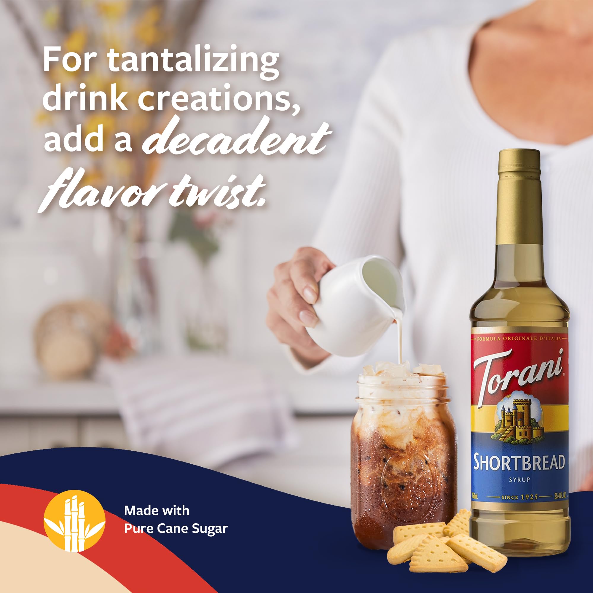 Torani 750ml bottle next to a coffee cup demonstrating size and serving capacity benefit