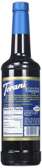 Torani chocolate syrup drizzled on ice cream, adding rich flavor appeal