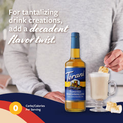 Torani bottle next to cup for scale, illustrating large 25.4 fl oz supply benefit