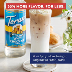 Torani white chocolate syrup pouring into a cup for quick mixing benefit