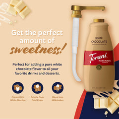 Torani sauce pouring over espresso to add creamy white chocolate flavor