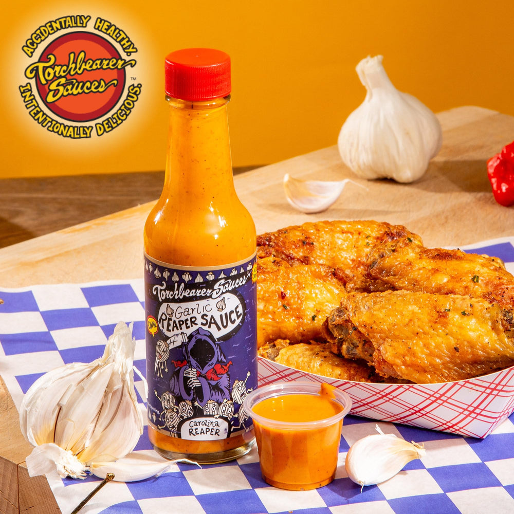 Torchbearer Sauces Garlic Reaper sauce texture on spoon showing creamy consistency