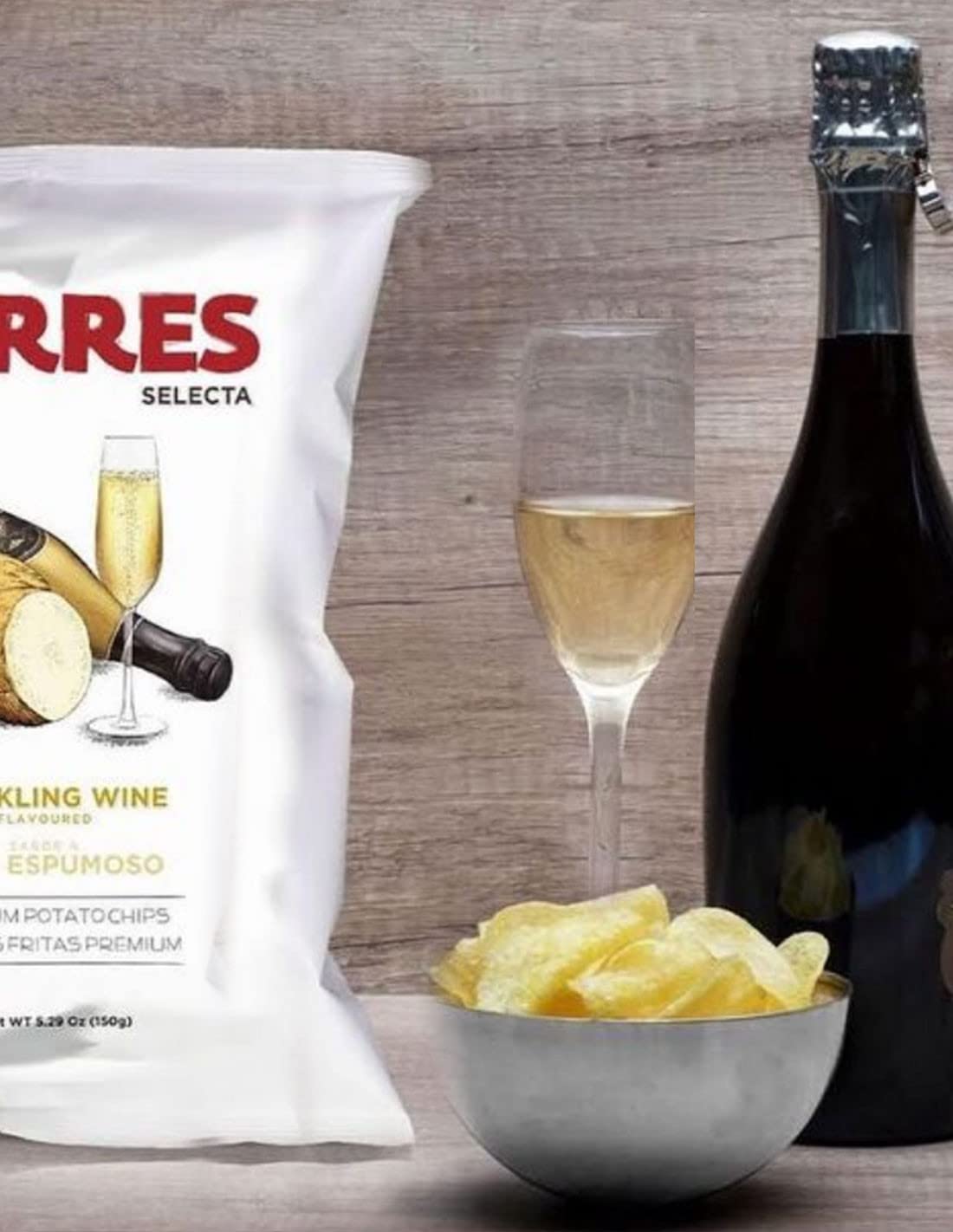 Torres on charcuterie board adding crunchy flavor to cheeses and meats