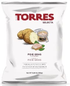 Torres chips at picnic scene conveying shareable gourmet snacking outdoors