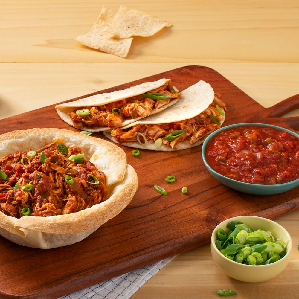Tostitos jars next to a hand showing 15.5 oz scale and portion clarity benefit